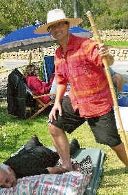 Pro bono barefoot deep tissue massage at public event in 2007